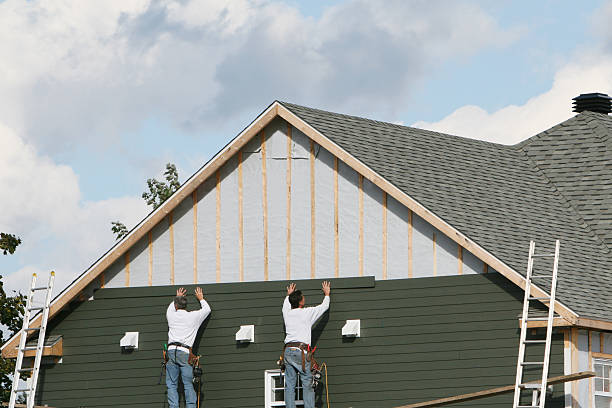Professional Siding Contractor technician working in Harwood, MD